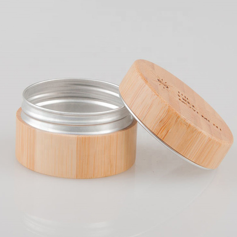 Bottiglia di crema per il viso in legno di bambù a forma di cilindro per imballaggio cosmetico da 5 g 15 g 30 g 50 g 100 g con vaso interno in alluminio Bottiglia di crema per il viso in legno di bambù a forma di cilindro per imballaggio cosmetico da 5 g 15 g 30 g 50 g 100 g con vaso interno in alluminio