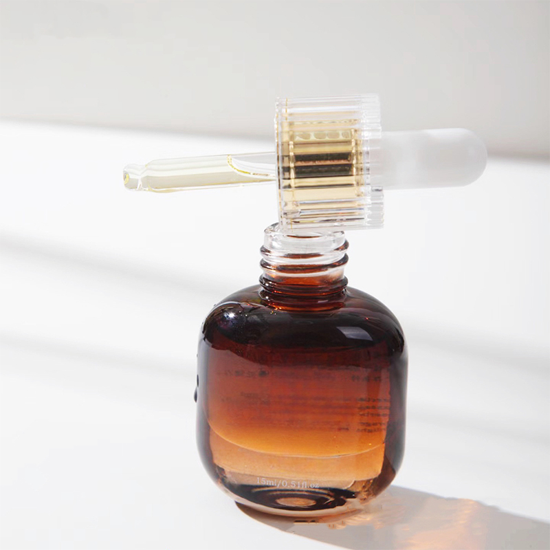 Flaconi contagocce in vetro nero ambrato per la cura della pelle personale Flaconi contagocce in vetro nero ambrato per la cura della pelle personale