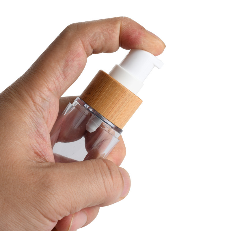 Bottiglia airless di bambù per lozione riciclabile da 50 ml per bottiglia cosmetica con pompa airless di bambù Bottiglia airless di bambù per lozione riciclabile da 50 ml per bottiglia cosmetica con pompa airless di bambù