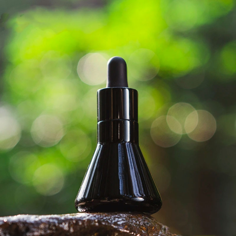 Imballaggio cosmetico per bottiglia di olio essenziale in vetro conico nero Imballaggio cosmetico per bottiglia di olio essenziale in vetro conico nero