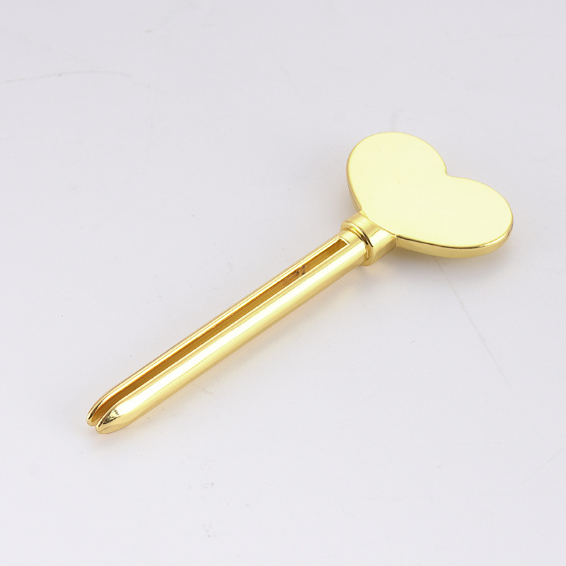 Dispenser di dentifricio in metallo Detergente per il viso Detergente per dentifricio Spremiagrumi a forma di chiave Spremiagrumi per cosmetici Dispenser di dentifricio in metallo Detergente per il viso Detergente per dentifricio Spremiagrumi a forma di chiave Spremiagrumi per cosmetici