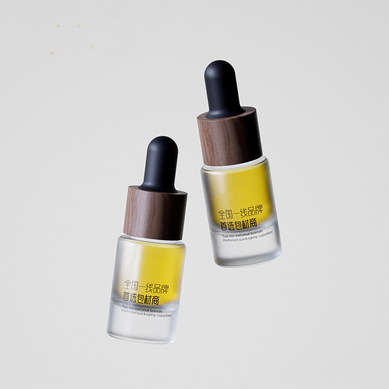 Piccole bottiglie di olio essenziale di vetro con contagocce in metallo o legno Piccole bottiglie di olio essenziale di vetro con contagocce in metallo o legno