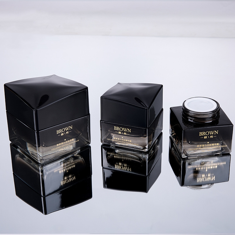 Barattolo per crema in vetro quadrato unico con design del coperchio rialzato per imballaggi cosmetici Barattolo per crema in vetro quadrato unico con design del coperchio rialzato per imballaggi cosmetici