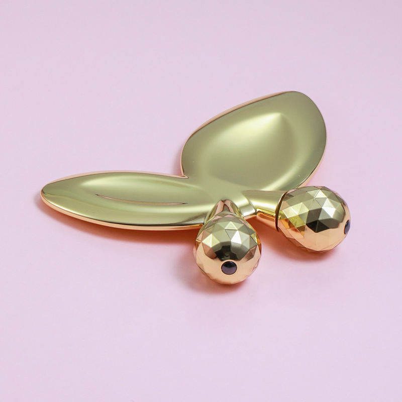 Rullo per massaggio facciale a forma di farfalla in lega di zinco Rullo per massaggio facciale a forma di farfalla in lega di zinco