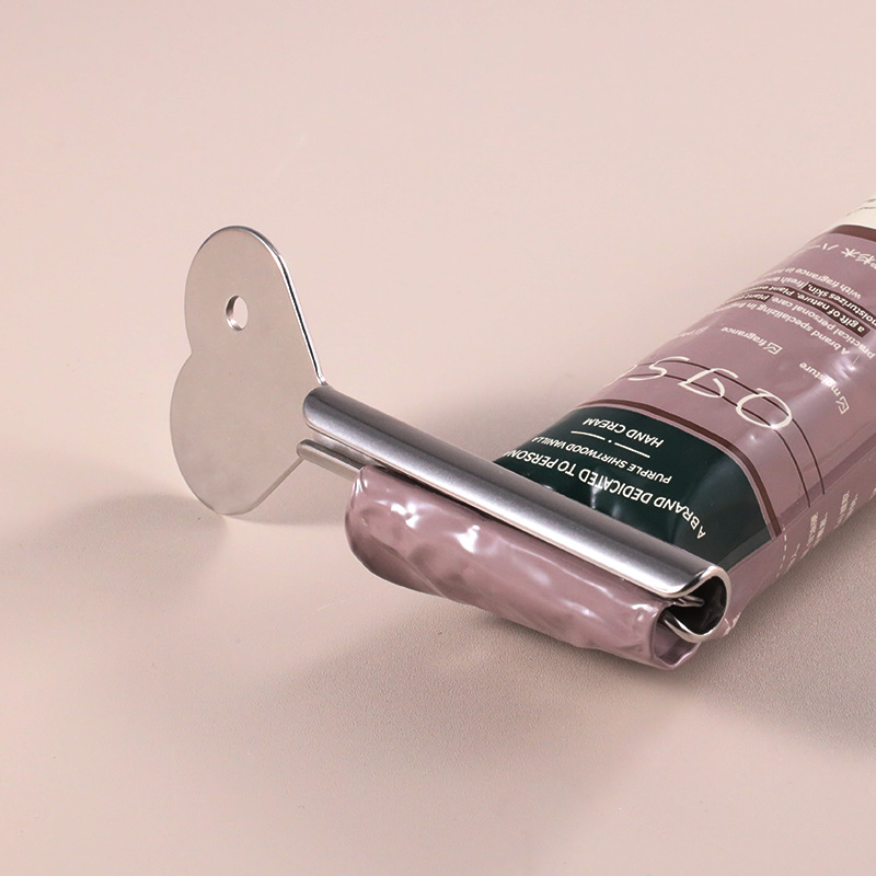 Chiave per spremitubo a rullo per dentifricio Chiave per spremitubo in acciaio inossidabile Chiave per spremitubo in metallo Chiave per spremitubo a rullo per dentifricio Chiave per spremitubo in acciaio inossidabile Chiave per spremitubo in metallo