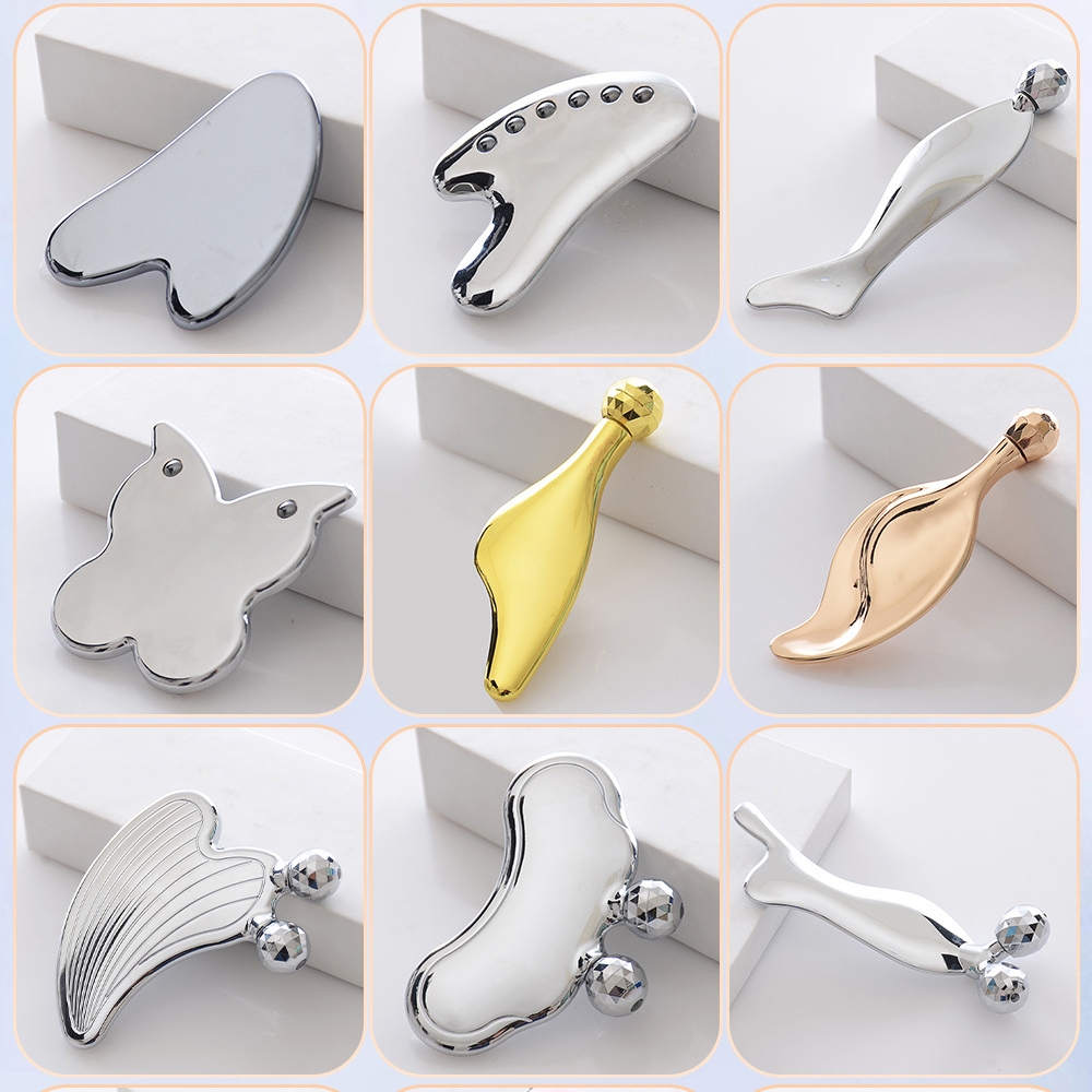 Nuovi arrivi Bastone per massaggio agli occhi per rilassarsi Anti-età Sfera a testa singola Massaggio per il corpo Strumento Guasha in metallo Rullo per il viso dei delfini Nuovi arrivi Bastone per massaggio agli occhi per rilassarsi Anti-età Sfera a testa singola Massaggio per il corpo Strumento Guasha in metallo Rullo per il viso dei delfini